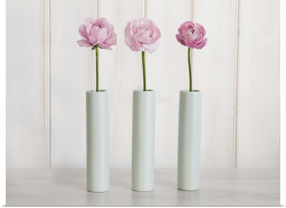 Row Of 3 Pink Flowers In Blue Vases