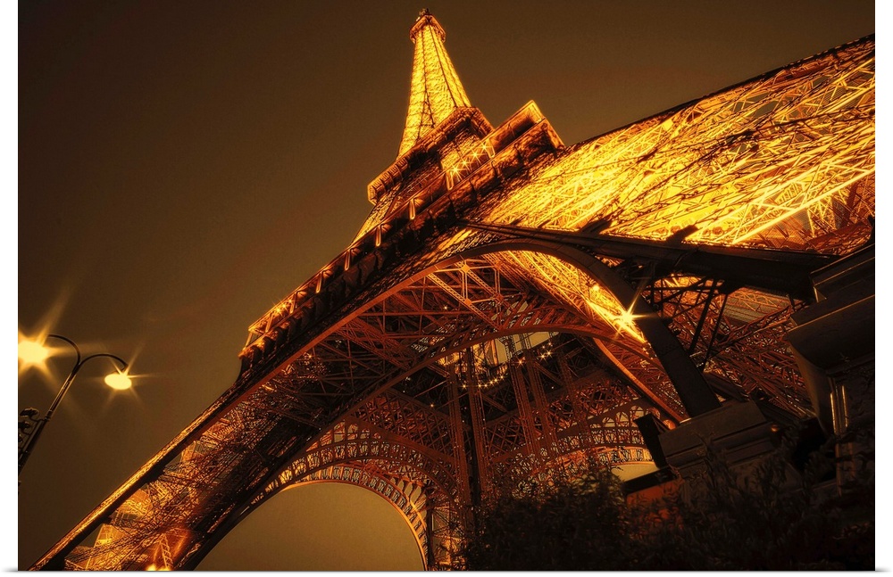 Angled shot of landmark in France brown and yellow toned photoeiffel tower paris