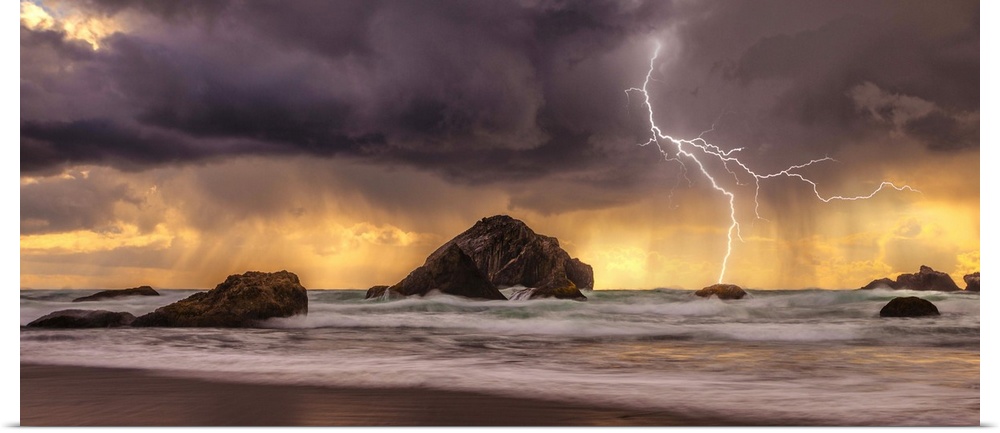 Lightning striking the ocean near sea stacks.