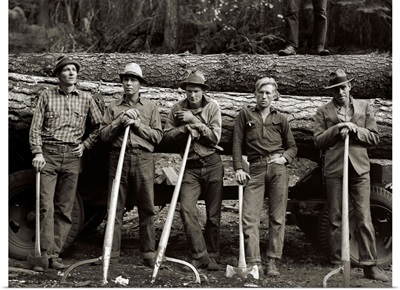 Vintage Photograph of Logging crew standing in front of felled tree on a wagon