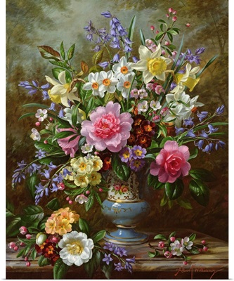 Bluebells, daffodils, primroses and peonies in a blue vase