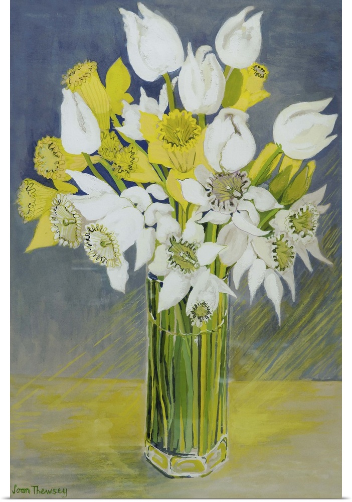 Daffodils and white tulips in an octagonal glass vase