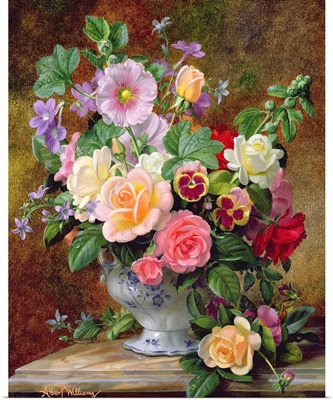 Roses, pansies and other flowers in a vase