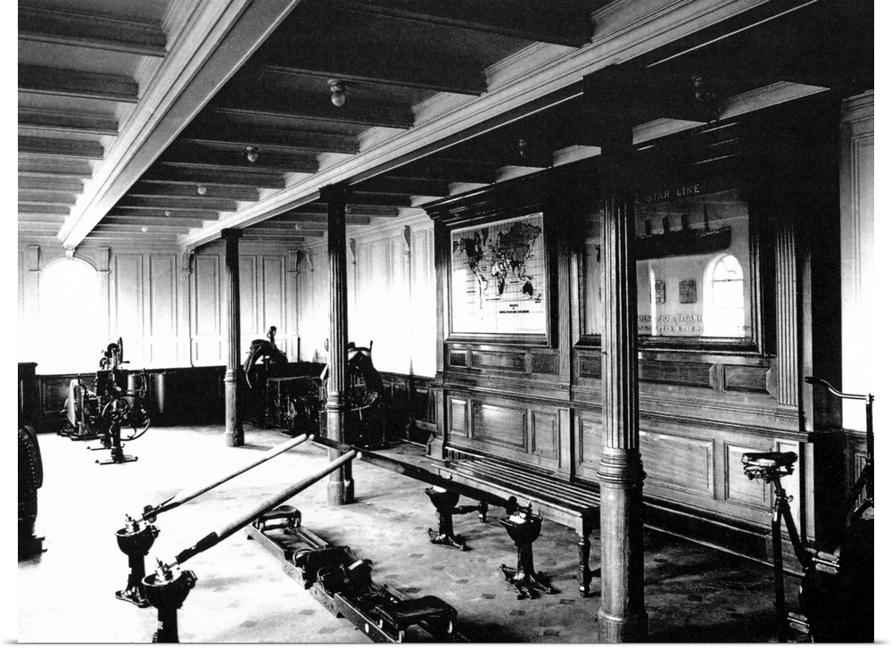 Landscape, vintage photograph from 1912 of the exercise room on the Titanic, including a rowing machine and stationary bikes.