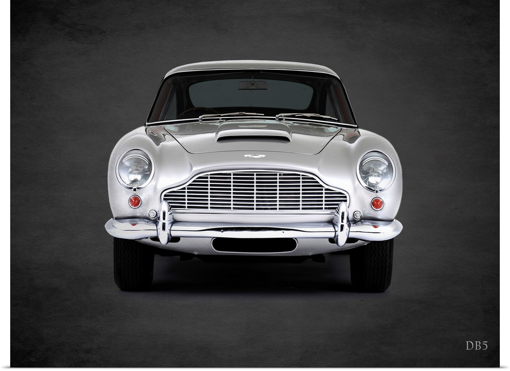 Photograph of a silver 1965 Aston Martin DB5 printed on a black background with a dark vignette.