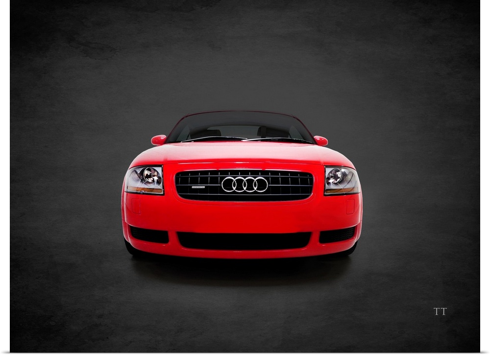 Photograph of a red Audi TT Quattro printed on a black background with a dark vignette.