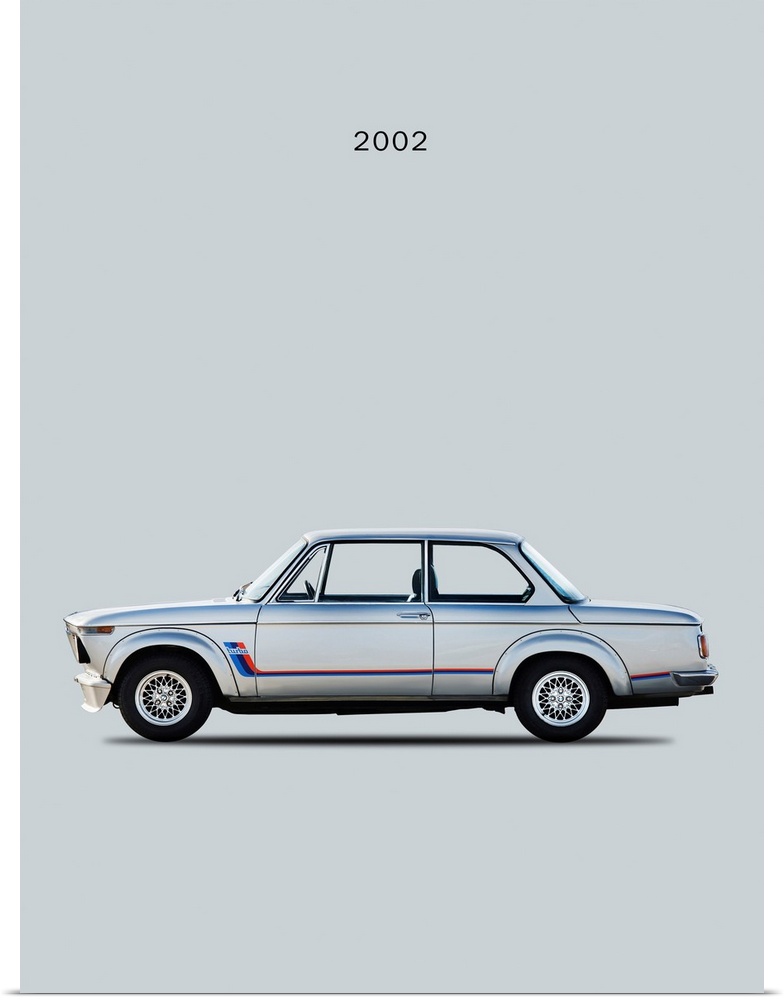 Photograph of a silver BMW 2002 Turbo printed on a gray background