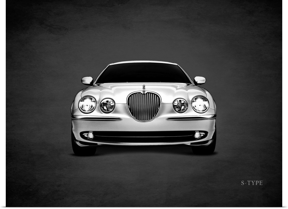 Photograph of a silver Jaguar S-Type printed on a black background with a dark vignette.