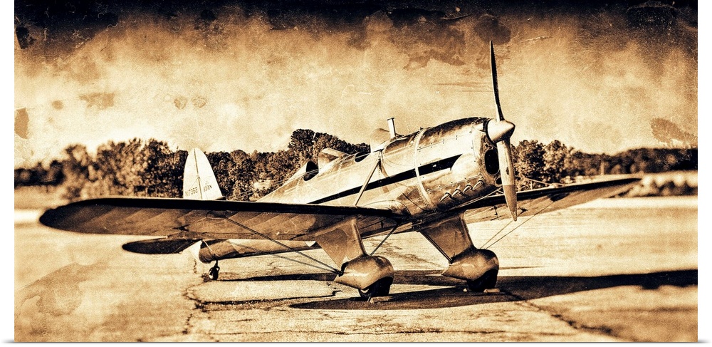 A distressed photograph of an antique airplane.