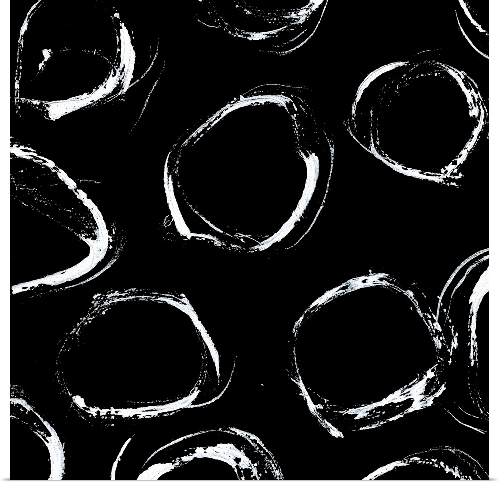 A square abstract of unrefined white circles against a black backdrop.