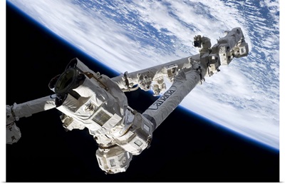 Canadarm2, readying to grab a Dragon spaceship soon