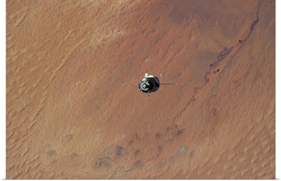 Soyuz in the Desert - coming up to dock with the Sahara below