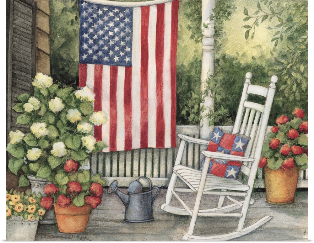 Front porch setting with white rocking chair, flowers and big american flag.