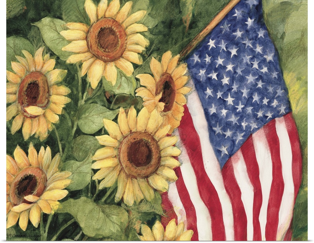 Garden sunflowers with an American flag nestled between them.