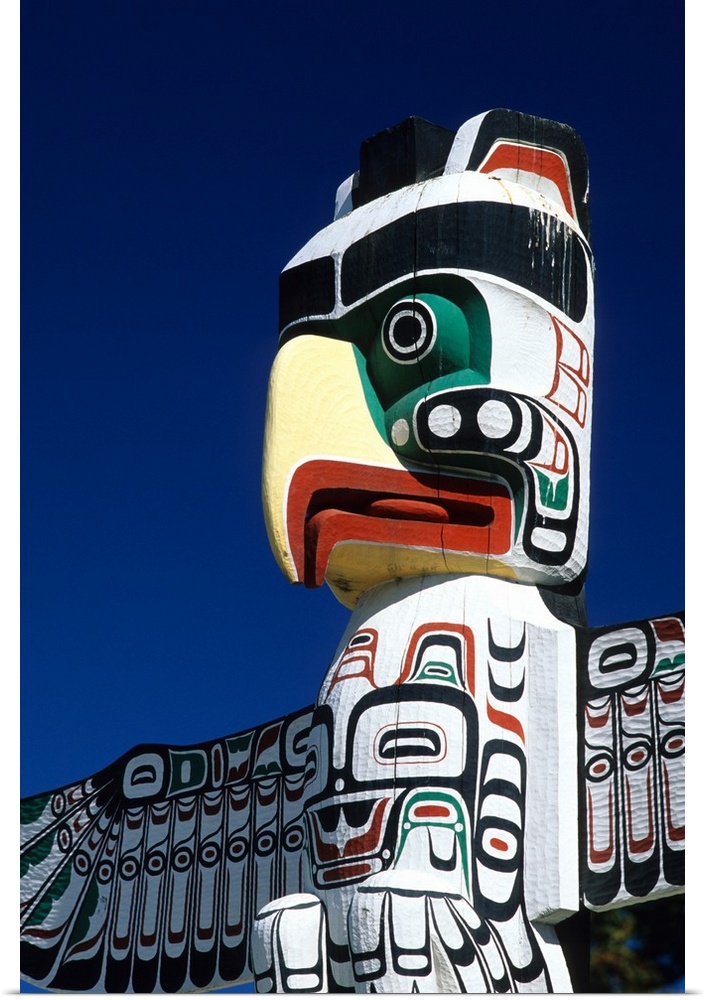 A totem pole In Vancouver, Canada...totem pole, eagle, wood, carving, northwest indians, native, wood, carve, vancouver, c...