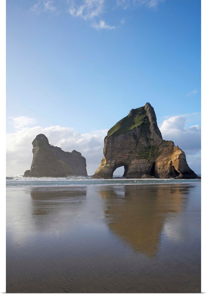 Archway Islands Reflected in Wet Sands of Wharariki Beach, near Cape Farewell, North West Nelson Region, South Island, New...