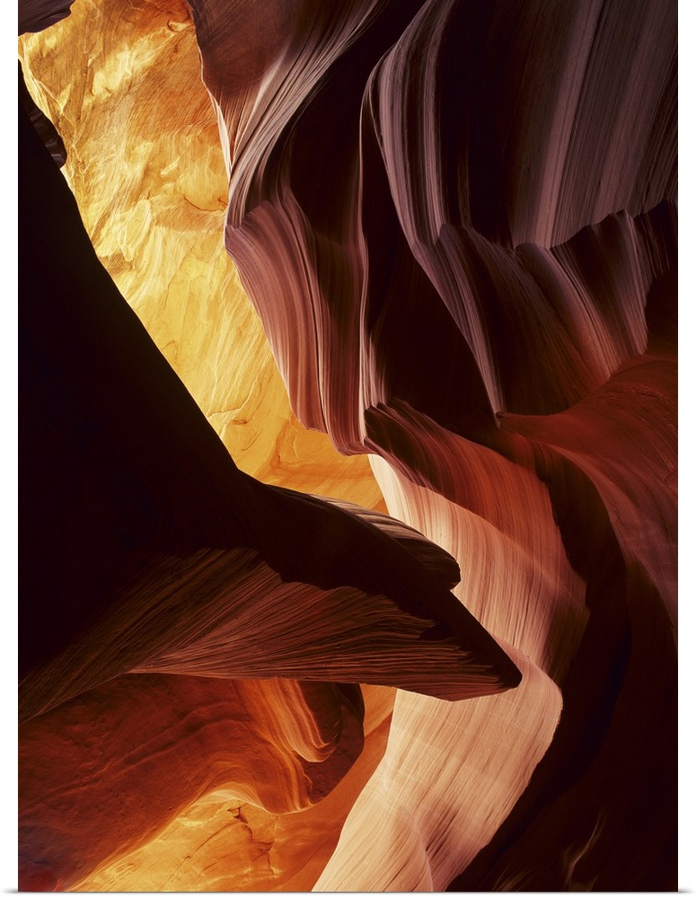 USA, Arizona, Navajo Tribal Land. Reflected sunlight creates amber walls in Lower Antelope Canyon.
