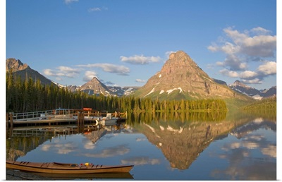 Boats and kayak along Two Medicine Lake in Glacier National Park in Montana