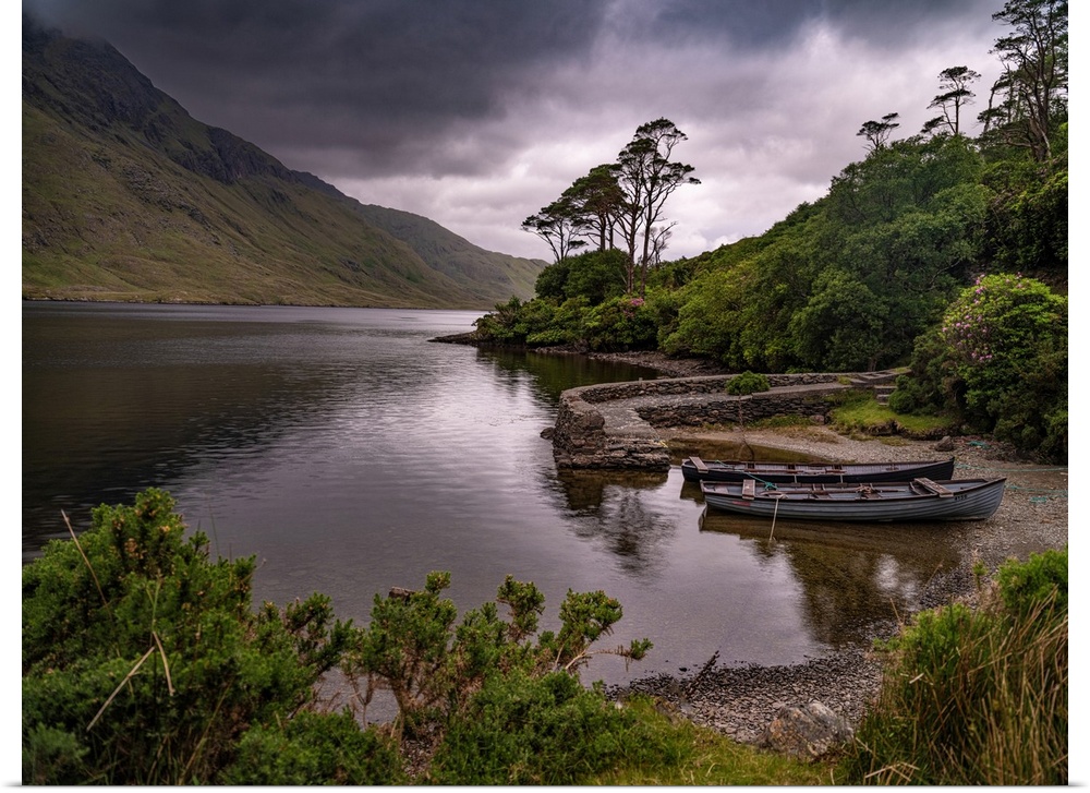 Boats wait for passengers at Doo Lough, part of a national park in County Mayo, Ireland.