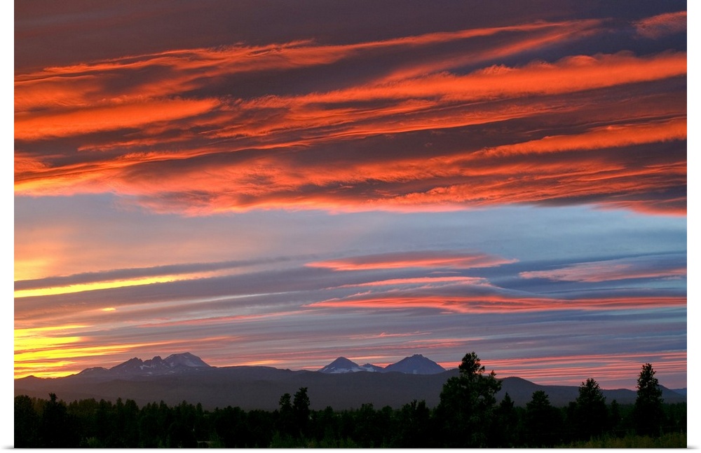 Brilliant colors compete with subtle ones over the Cascades Range of central Oregon, Bend.