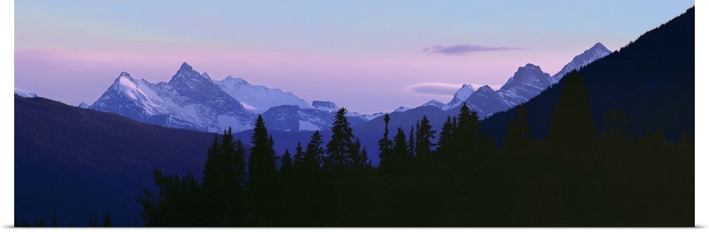 Canada, British Columbia, Mt Terry Fox. Mount Terry Fox turns periwinkle in the settling dusk, British Columbia, Canada.