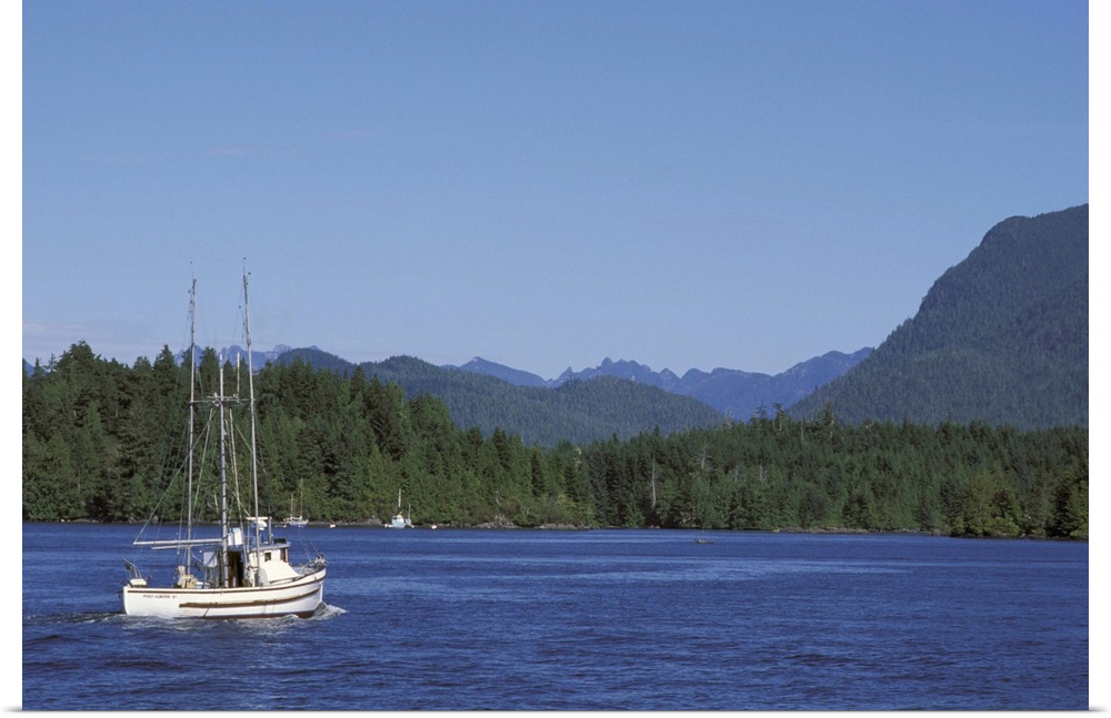Canada, British Columbia, Vancouver Island.Fishing boat from Tofino harbor into Clayoquot Sound