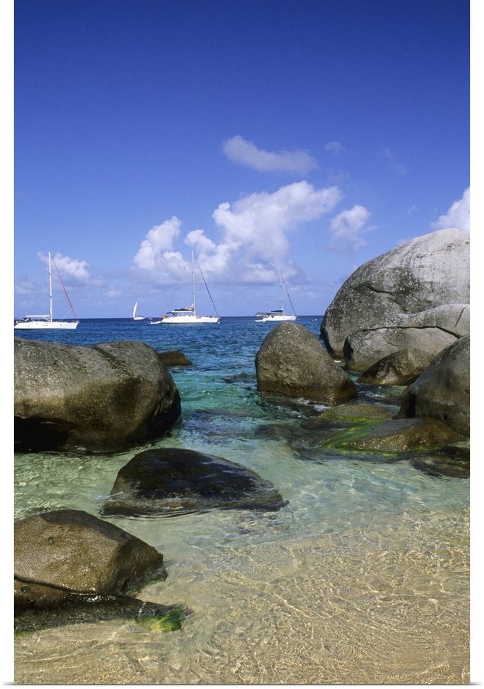 Beautiful rock formation boulder rocks with blue water ocean at The Baths of Virgin Gorda in British Virgin Islands.
