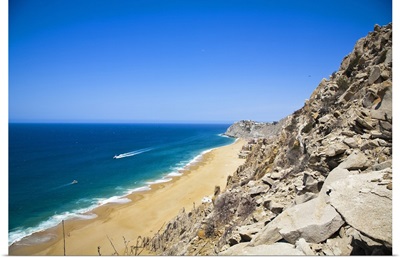 Cabo San Lucas, Baja California Sur, Mexico, a beach with a large rock formation