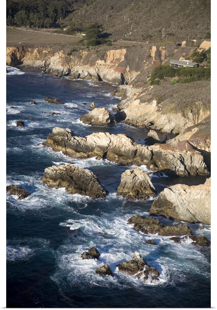 California, Big Sur, ragged and rough cliffs drop down to the sweeping coastline on Highway 1.
