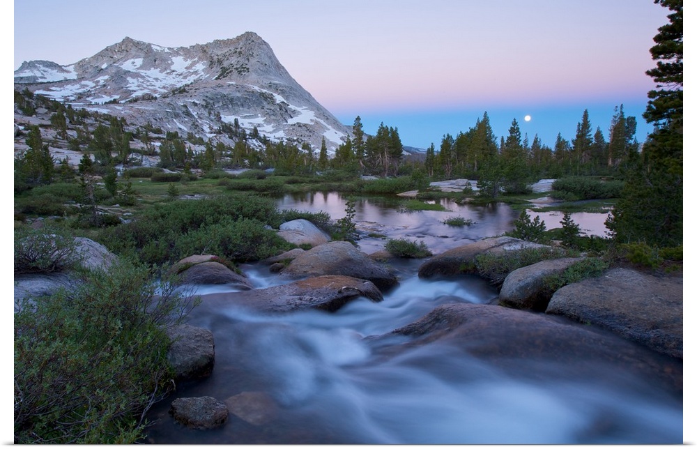 North America, USA, California, Yosemite National Park. Moonset at sunrise with Vogelsang Peak.