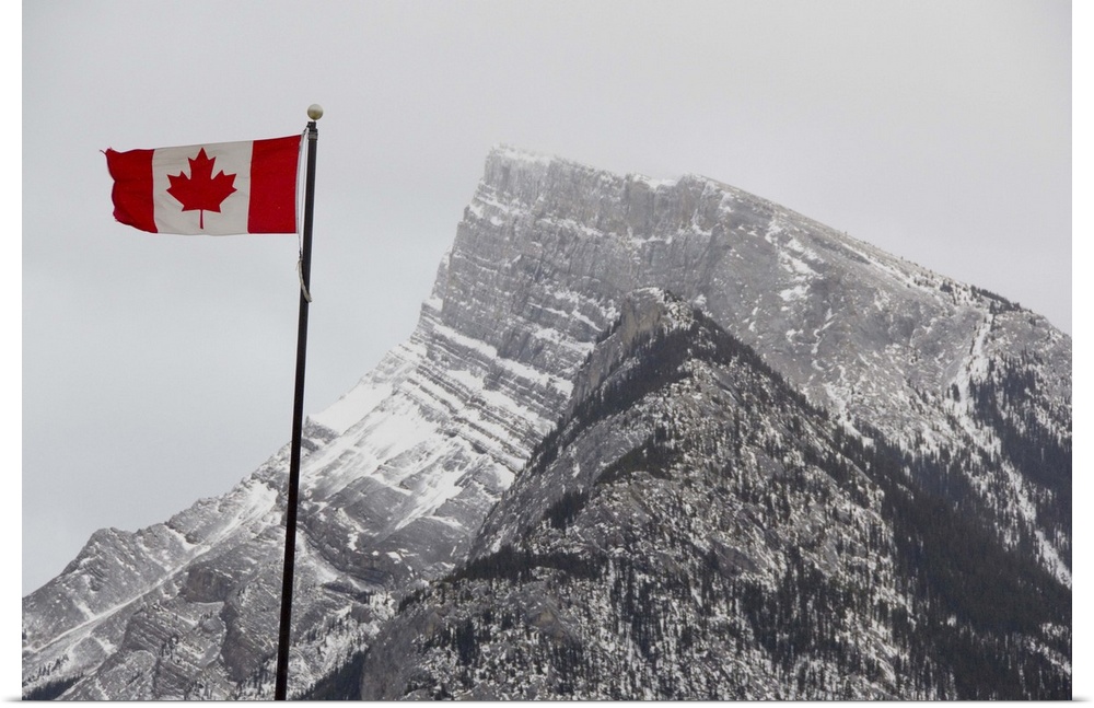 Canada, Alberta, Banff. Mountain view with flag.
