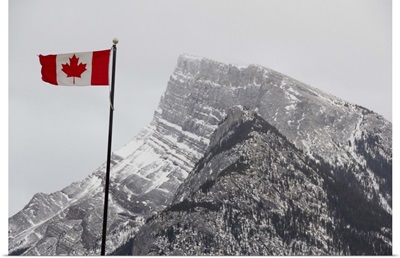 Canada, Alberta, Banff. Mountain view with flag
