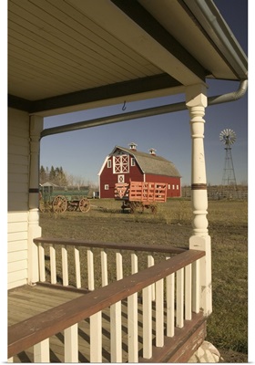 Canada, Alberta, Front Porch of Historic House Looking Towards Barn