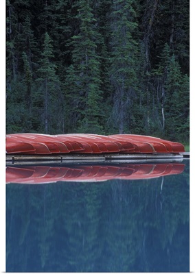 Canada, Banff, Alberta. Canoes line the shores of Lake Louise