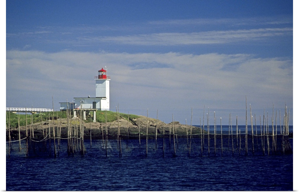 Canada: New Brunswick, Bliss Harbor, Bliss Point Light with fish weirs, July