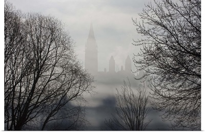 Canada, Ontario, Parliament Buildings seen through fog on Ottawa River
