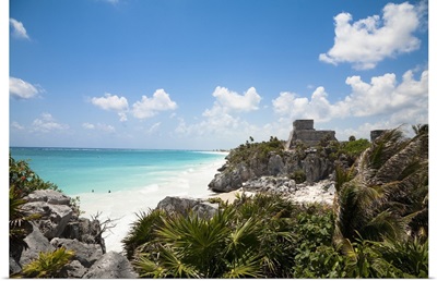 Cancun, Quintana Roo, Mexico, sandy beach behind tropical foliage