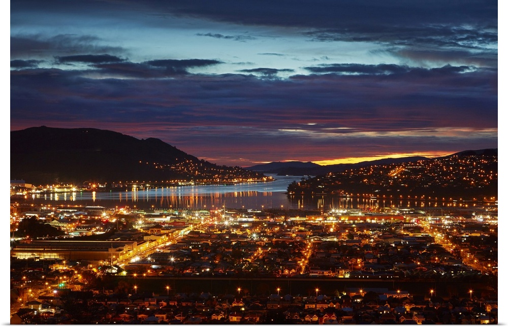 City lights, south Dunedin and Otago harbor, Dunedin, South Island, New Zealand.