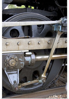 Close up detail view of steam locomotive drive wheel