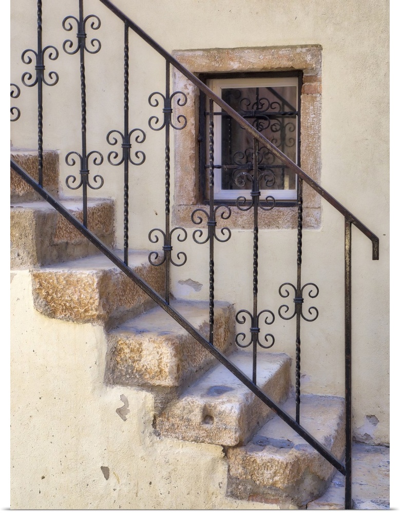 Croatia, Rovinj, Istria. Stairs and wrought iron railing leading to a home.