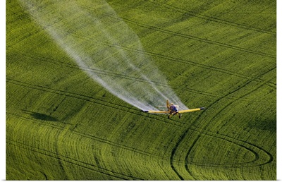 Crop Duster Applying Chemicals On Wheat Fields Near Colfax, Washington State, USA