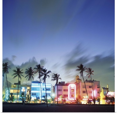 Florida, Miami, South Beach. Art Deco architecture and palm trees along the strip