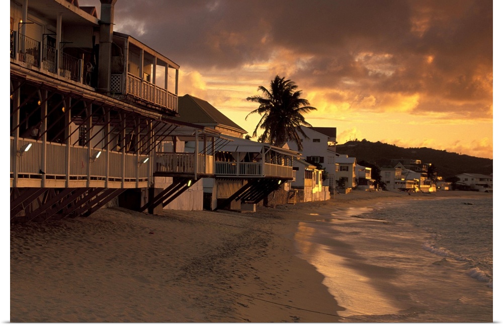 Caribbean, French West Indies, St. Martin.Grand Case; Il Nettuno and beach, sunset; St. Martin's dining capital.