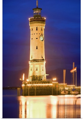 Germany, Lake Constance, View of lighthouse on Lindau Island at sunset