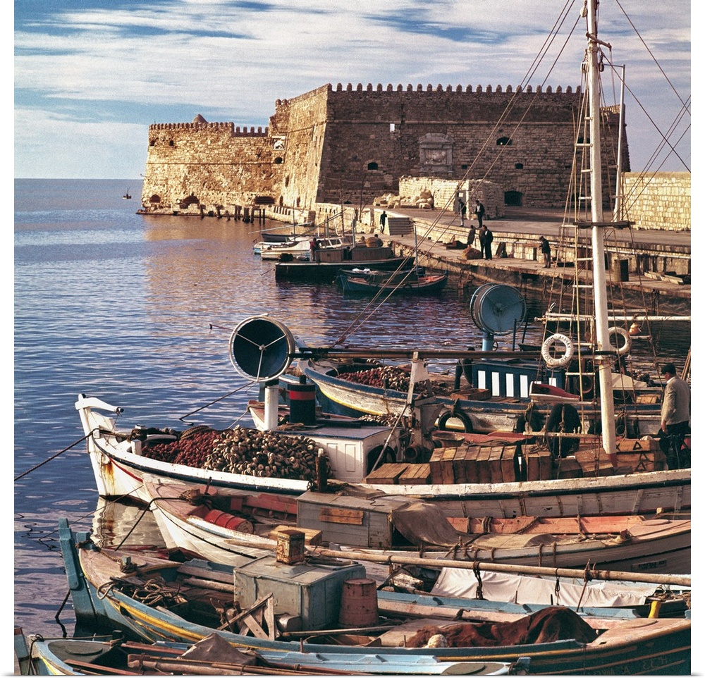 Europe, Greece, Iraklion. Fishing boats are moored at the old port near the Rossa al Mare at Iraklion, Crete, Greece.