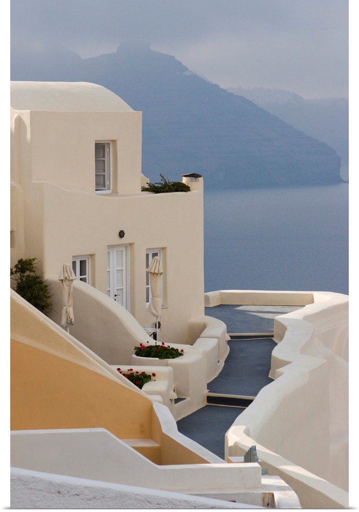 Europe, Greece, Santorini, Thira, Oia. Pathway to end villa overlooking the sea.