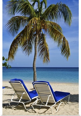 Grenada. Beach chairs on Grand Anse Beach Grenada