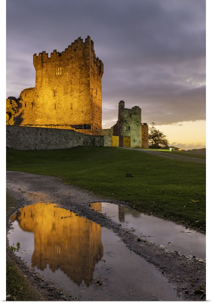 Historic Ross Castle at dusk in Killarney National Park, Ireland.