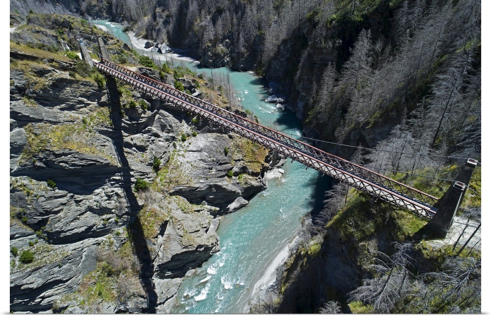 Historic skippers suspension bridge (1901), above shotover river, skippers canyon, Queenstown, South Island, New Zealand.