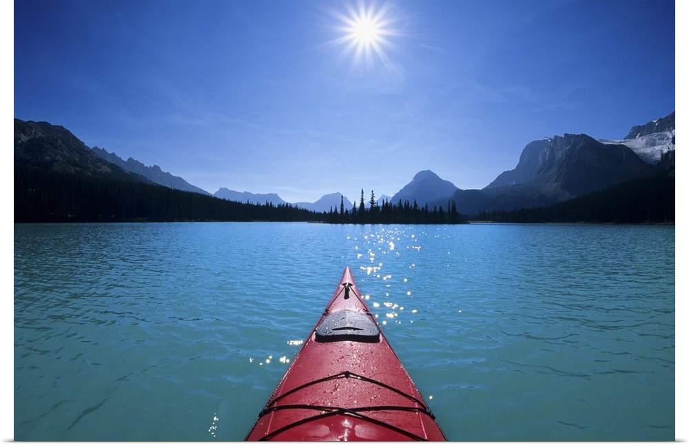Kayaking on Bow Lake in the Canadian Rockies of Banff National Park, Alberta, Canada.